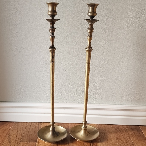 Vintage pair of heavy tall thin brass candlesticks
